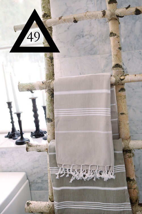 a-rack-for-towels-or-magazines-using-tree-branches.jpg